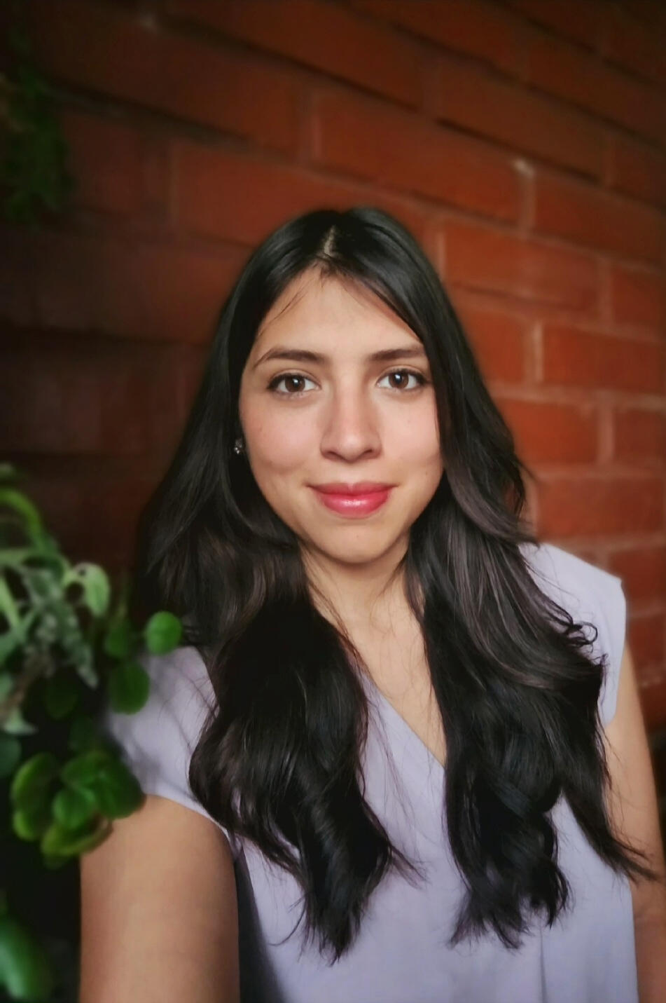 Psicóloga Sue-Ann Burdiles que realiza psicoterapia online para procesar rupturas amorosas.